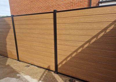 Oak effect composite fencing and gates