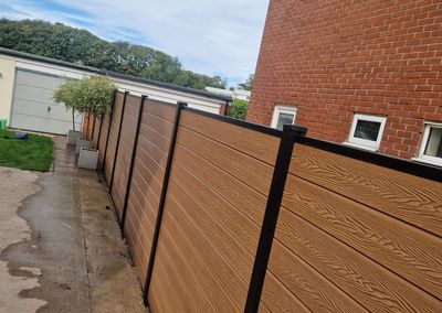 Oak effect composite fencing and gates
