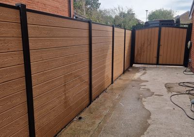 Oak effect composite fencing and gates