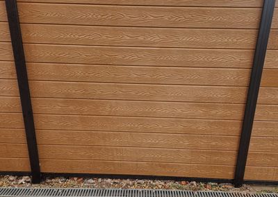 Oak effect composite fencing and gates