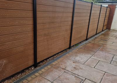 Oak effect composite fencing and gates